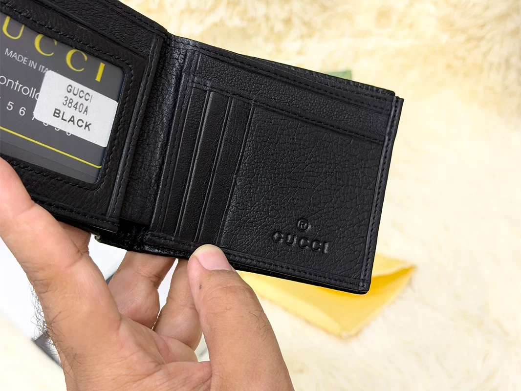 Gucci Black Diagonal Embossed GG Bifold Wallet