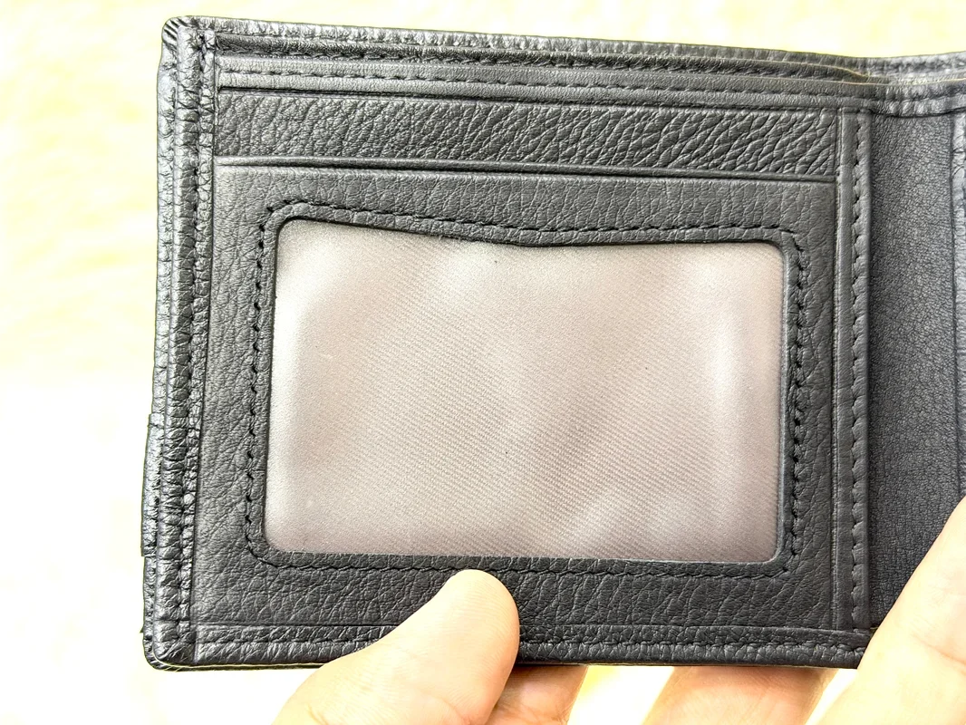 Gucci Black GG Embossed Wallet