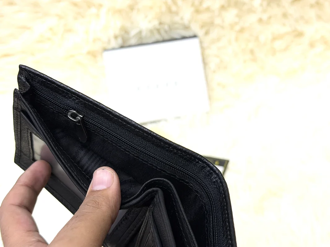Gucci Black GG Embossed Wallet