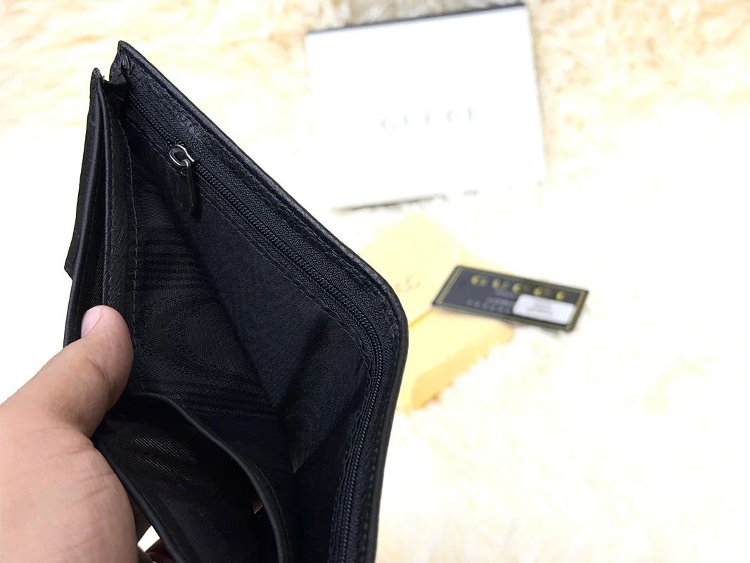 Gucci Black GG Embossed Wallet