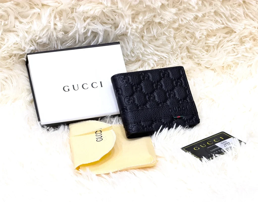 Gucci Black GG Embossed Wallet