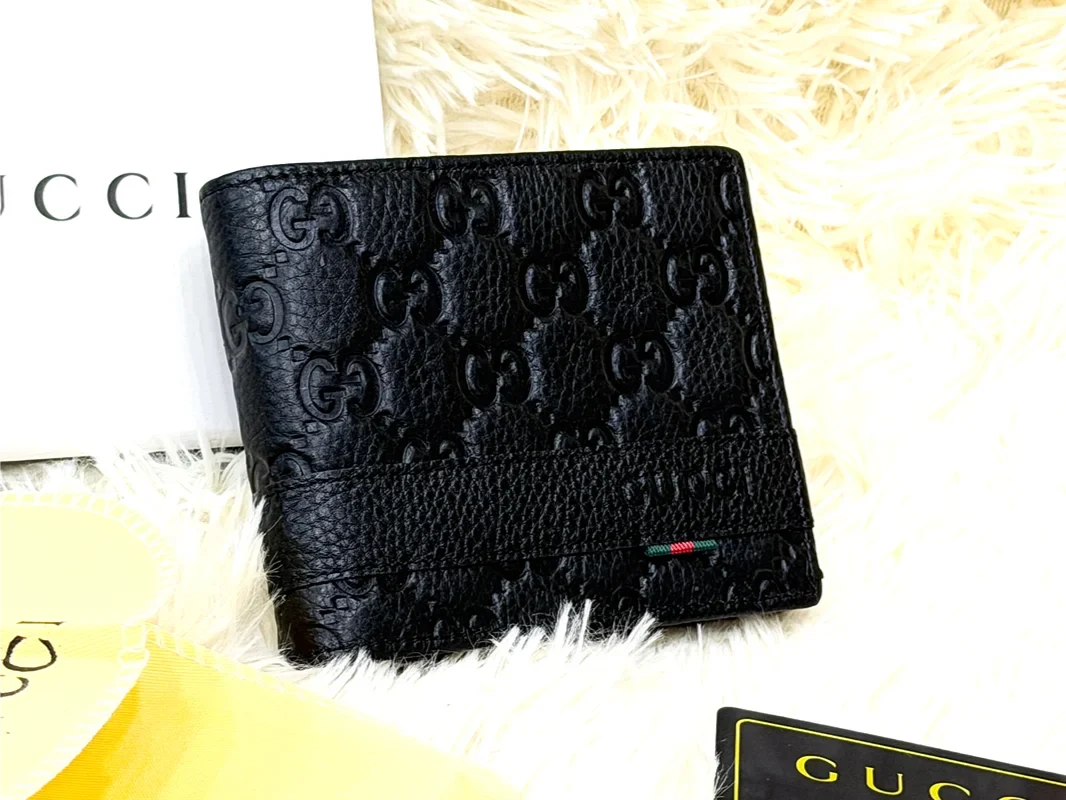Gucci Black GG Embossed Wallet