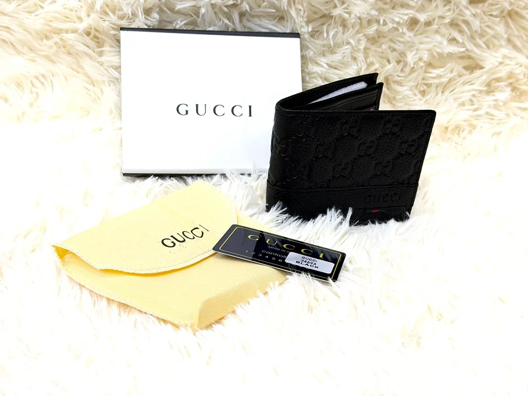 Gucci Black GG Embossed Wallet