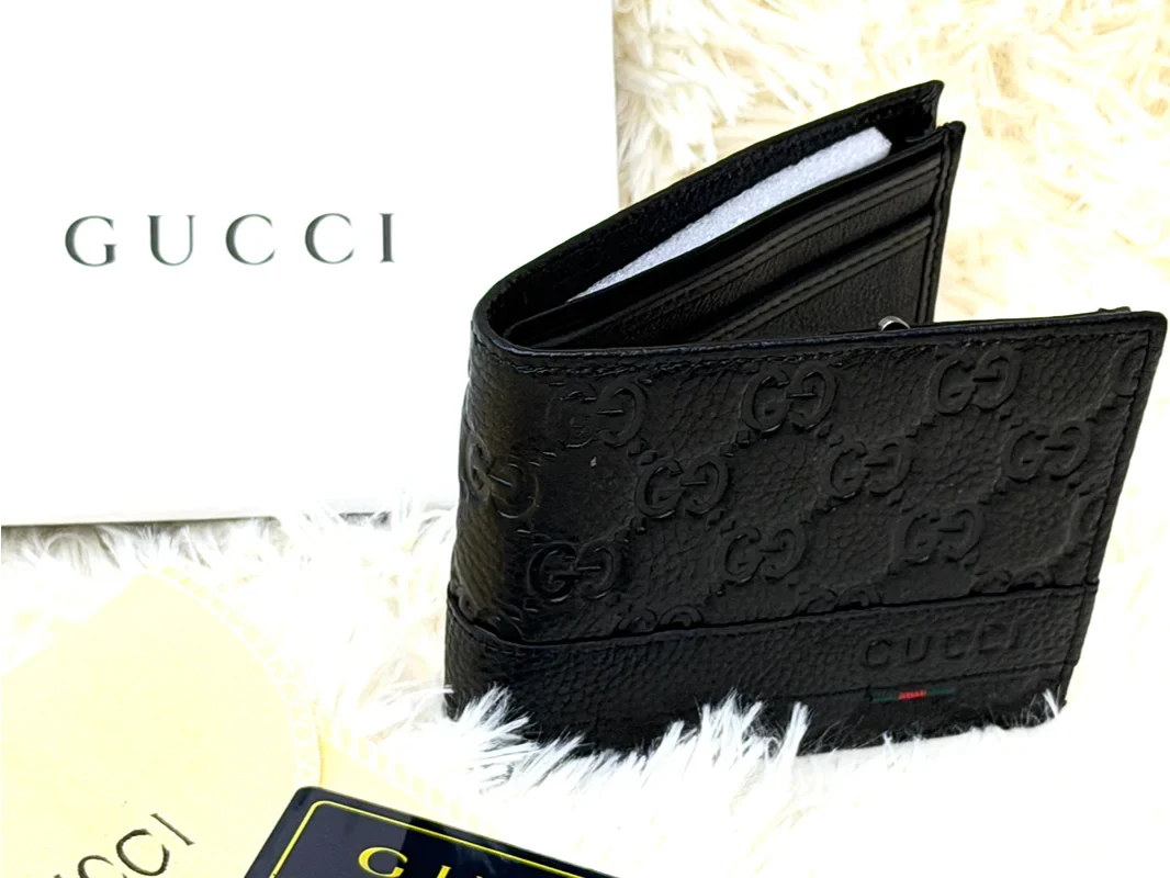 Gucci Black GG Embossed Wallet