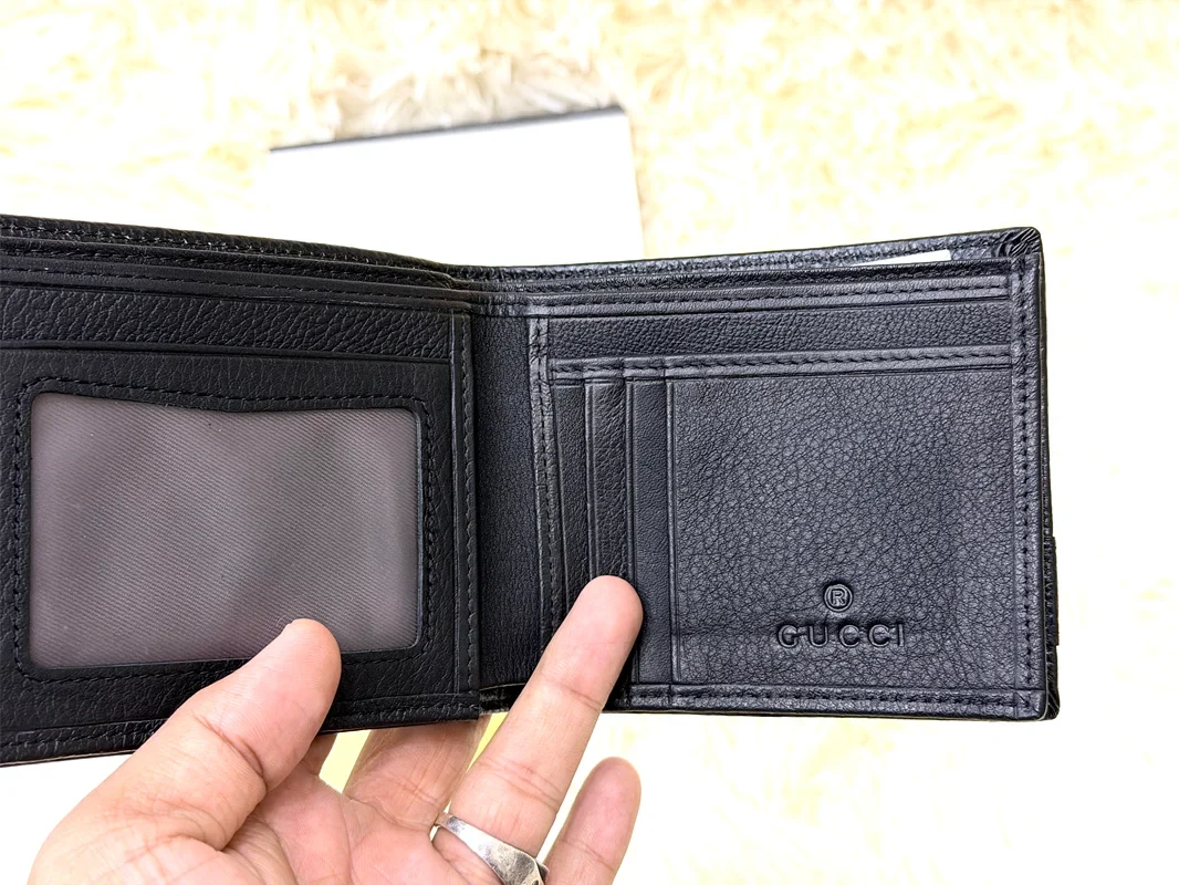 Gucci Black GG Embossed Wallet