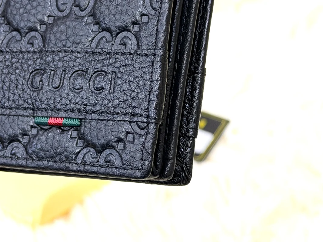 Gucci Black GG Embossed Wallet
