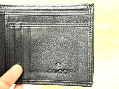 Gucci Black GG Embossed Wallet