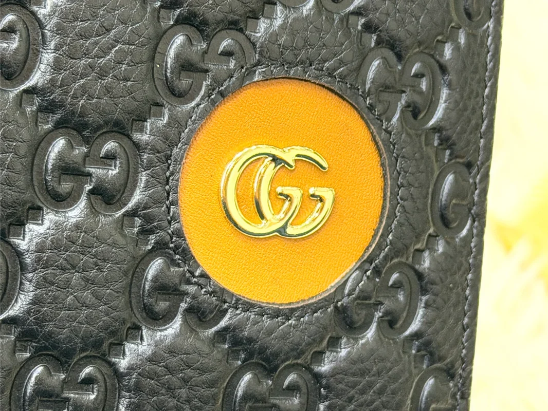 Gucci Black GG Monogram Wallet with Gold Detail