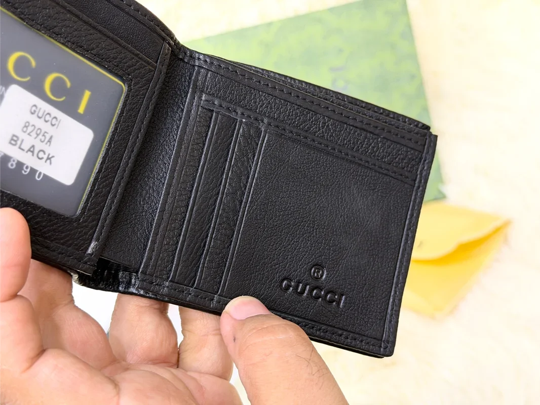 Gucci Black Textured Bifold Wallet with Web Stripe Detail