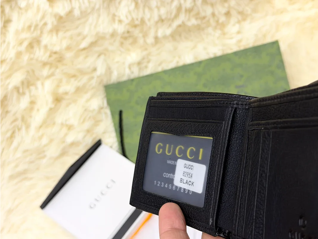Gucci Black Textured Bifold Wallet with Web Stripe Detail