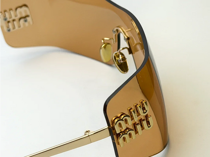 Miu Miu OMUB53S Amber Shield Sunglasses