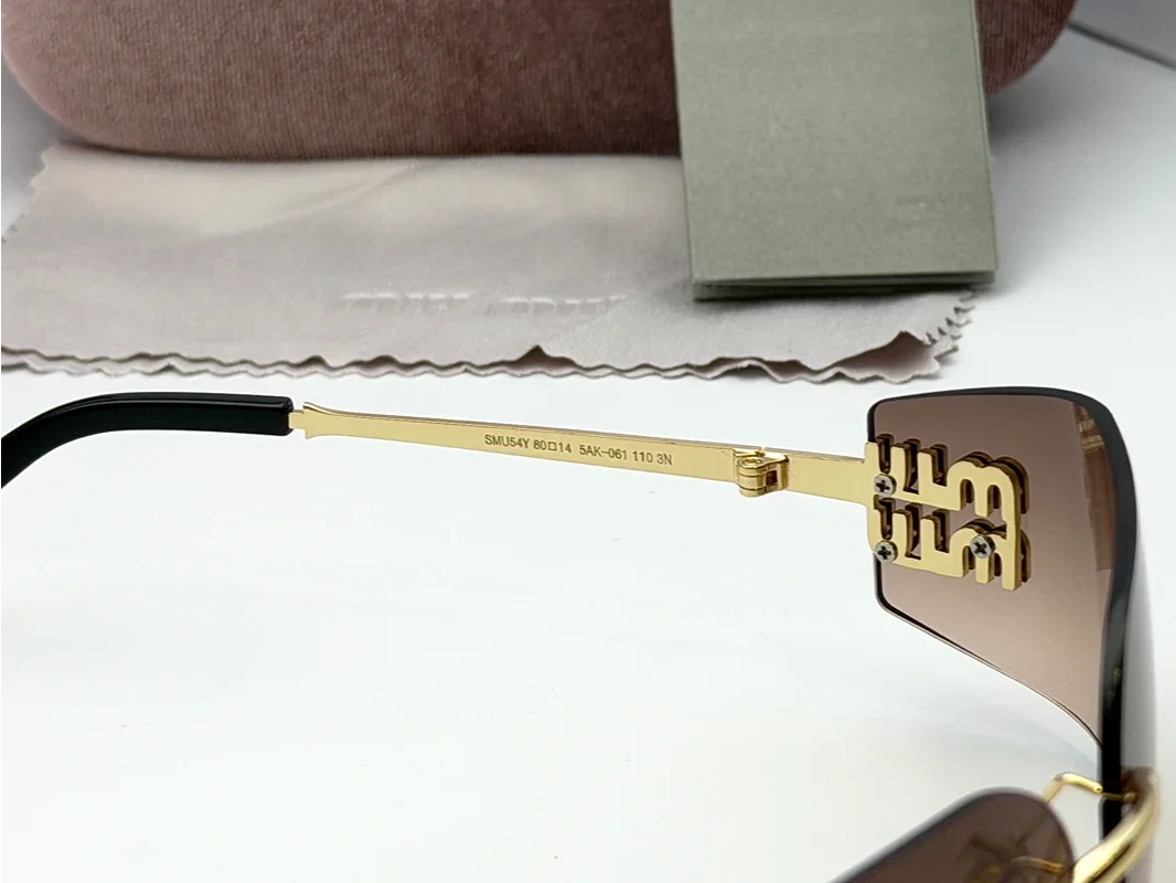 Miu Miu SMU54Y Brown Gradient Sunglasses